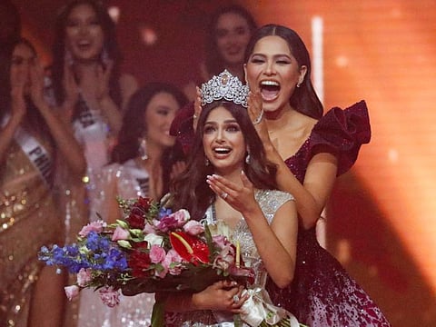 Miss Universe 2020 Andrea Meza, right, crowns India's Harnaaz Sandhu as Miss Universe 2021 during the 70th Miss Universe pageant on December 13, 2021, in Eilat, Israel.