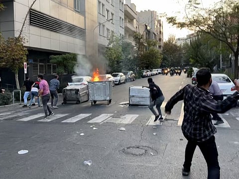 Clashes during a protest for Mahsa Amini in Tehran on September 20, 2022.  