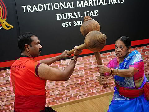 Meenakshi Amma showcasing her kalari skills at the just opened third branch of of VKM Kalari Dubai in the emirate on Wednesday. 