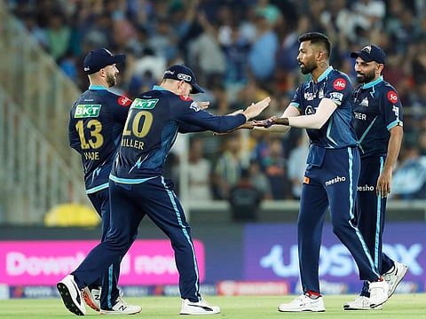 Gujarat Titans players celebrate during their maiden title-winning Indian Premer League season this year.