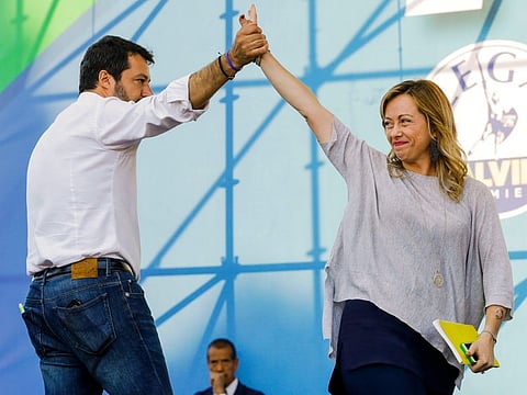 The League's leader Matteo Salvini, left, and Brothers of Italy's leader Giorgia Meloni address a rally in Rome in this Saturday, Oct. 19, 2019 file photo. AP