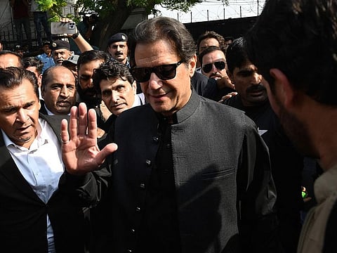 Pakistan's former Prime Minister Imran Khan leaves after appearing before the High Court in Islamabad on September 22, 2022.  