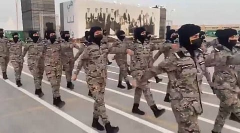 Saudi female conscripts participate in a parade ahead of the National Day.