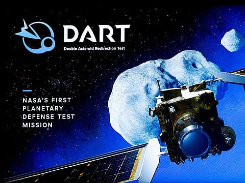 A placard hangs on the wall during the Double Asteroid Redirection Test (DART) Technology Media Workshop Telecon Briefing.