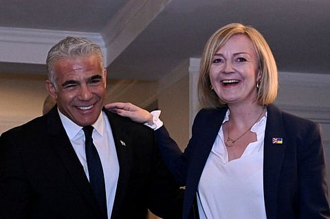 British Prime Minister Liz Truss and Israeli Prime Minister Yair Lapid hold a bilateral meeting as they attend the 77th UN General Assembly, in New York, on September 21, 2022. 