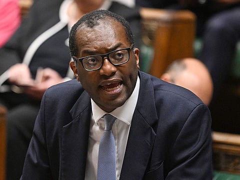 Britain's Chancellor of the Exchequer Kwasi Kwarteng unveiling an anti-inflation budget plan at the House of Commons in London.