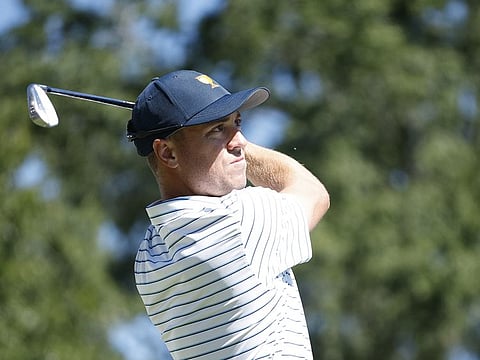 Justin Thomas of the United States Team plays his shot from the fourth tee during Friday four-ball matches on day two of the 2022 Presidents Cup at Quail Hollow Country in Charlotte, North Carolina. 
