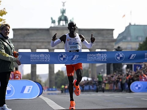  Kenya's Eliud Kipchoge crossing the line with a new world marathon record