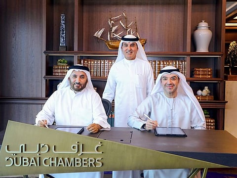 Abdul Aziz Al Ghurair, Chairman of Dubai Chambers; Butti bin Mejren, Director General of DLD, and Hassan Al Hashemi, Acting President & CEO of Dubai Chambers.
