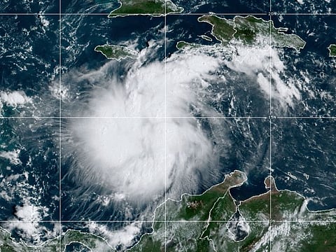 This satellite image provided by the National Oceanic and Atmospheric Administration shows Tropical Storm Ian over the central Caribbean on Saturday, Sept. 24, 2022.  