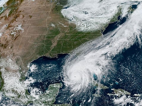 Hurricane Ian makes its way to Florida's west coast after passing Cuba in a composite image from the National Oceanic and Atmospheric Administration (NOAA) GOES-East weather satellite September 27, 2022. 