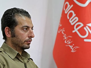 Iranian Kurd Erfan Salih, 34, the cousin of Mahsa Amini, who died in police custody in Iran, at a base for the Iranian Kurdish nationalist group Komala, outside the northern Iraqi city of Suleimaniyah. File photo taken on September 26, 2022. 