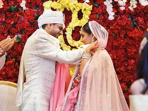 While Yutika looked ethereal in a soft pink lehenga, Chandan looked handsome in a cream sherwani and a pink pagdi