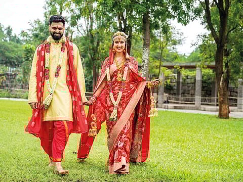 Bride Ankita wears a Asha Gautam bridal saree on her wedding day