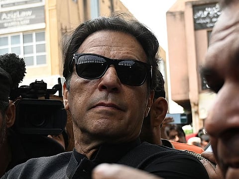 Pakistan's former Prime Minister Imran Khan arrives to appear before the High Court in Islamabad on September 22, 2022. 