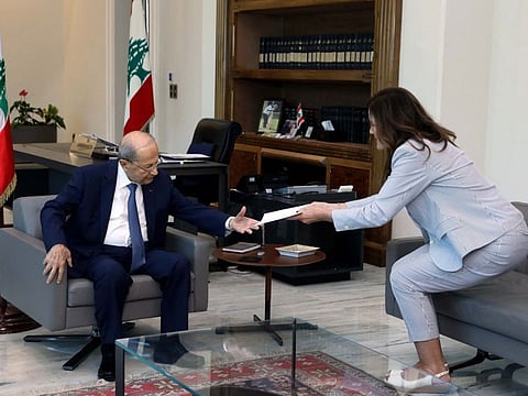 Lebanese President Michel Aoun receives the letter from US Ambassador to Lebanon Dorothy Shea at the presidential palace in Baabda, east of the capital on October 1, 2022. 