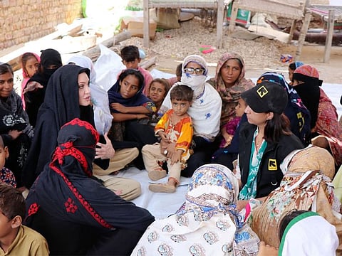 UNHCR Special Envoy Angelina Jolie and IRC Country Director Pakistan Shabnam Baloch with flood affectees in Sehwan, Sindh