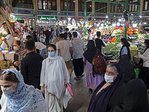 Iranian women shop at the Tajrish traditional bazaar in the capital Tehran on October 2, 2022.