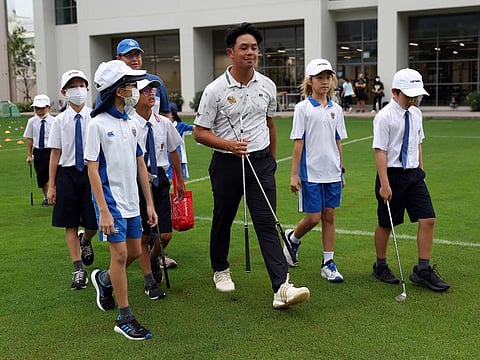 Ratchanon 'TK' Chantananuwat, 15 year-old Thai golfer and Tournament Ambassador for this week's LIV Golf Invitational Bangkok, hosting a golf clinic for his fellow schoolmates.