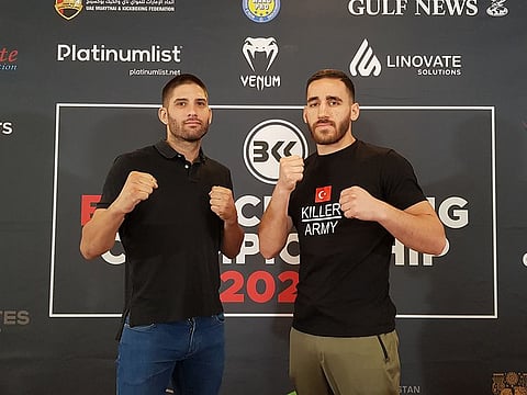 Ruben Lee of Spain (left) poses with Sedar Eroglu of Turkey ahead of their kickboxing world championship fight which will take place on Saturday October 8 at Al Nasr’s Rashid Bin Hamdan Hall.