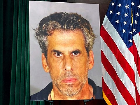 A photo of TV producer Eric Weinberg is displayed before a news conference to announce sexual assault charges against Weinberg on Wednesday, Oct. 5, 2022 in Los Angeles.