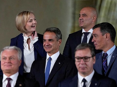 British Prime Minister Liz Truss, speaks with North Macedonia's Prime Minister Dimitar Kovacevski, at a group photo during a meeting of the European Political Community at Prague Castle in Prague, Czech Republic, October 6, 2022.