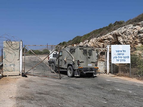 Israeli soldiers enter their military base at Rosh Hanikra, known in Lebanon as Ras Al Naqura, at the border between the two coutries, on October 4, 2022. 