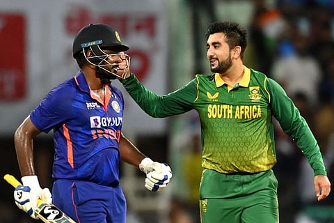 South Africa's Tabraiz Shamsi (right) gestures to India's Sanju Samson at the end of the first one-day international at the Ekana Cricket Stadium in Lucknow. The two teams are all set to clash again tomorrow.