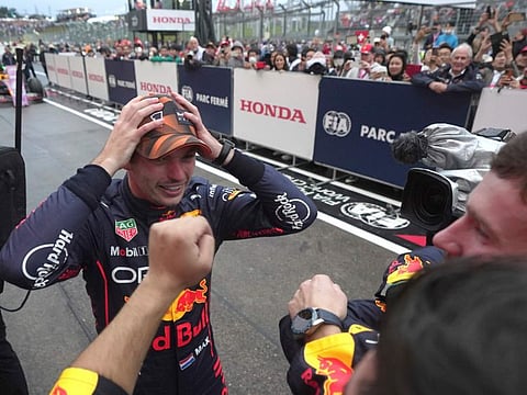 Red Bull driver Max Verstappen of the Netherlands celebrates his win during the Japanese Formula One Grand Prix at the Suzuka Circuit in Suzuka, central Japan.