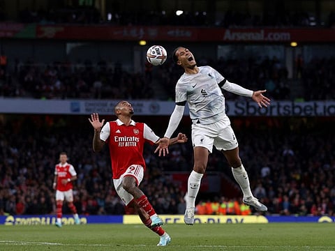 Arsenal's Brazilian striker Gabriel Jesus (left) and Liverpool's Dutch defender Virgil van Dijk vie for the ball during the English Premier League match at the Emirates Stadium in London.