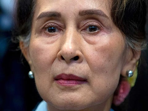Myanmar's leader Aung San Suu Kyi waits to address judges of the International Court of Justice on the second day of three days of hearings in The Hague, Netherlands, Dec. 11, 2019. Myanmar convicted ousted leader Aung San Suu Kyi on two more corruption counts on Wednesday, Oct. 12, 2022, extending her total prison term to 26 years. 