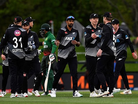 New Zealand players congratulate each other after their victory over Bangladesh in the Twenty20 tri-series at Hagley Oval in Christchurch.
