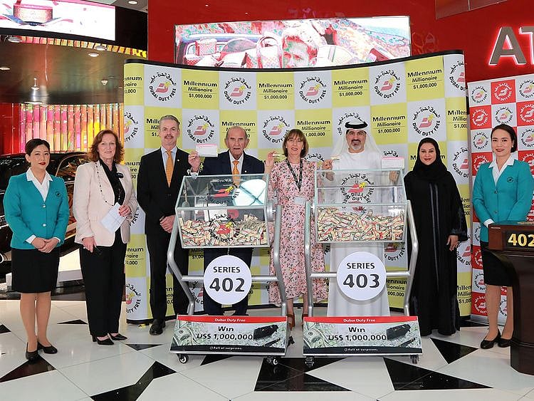 Dubai_Duty_Free_officials_at_the_Dubai_Duty_Free_Millennium_Millionaire_draw_for_Series_402_&_403-1665573649454