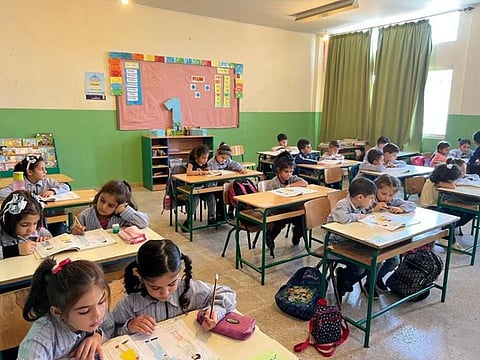 Students at the International School of Lebanon doing exercises in a classroom during a science class. Beirut, Lebanon on October 2022.
