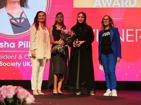 Sheikha Mozah (third from left) presenting the 'Aspiring Teen Award' to Nitasha Pillay from South Africa at the ceremony in Dubai