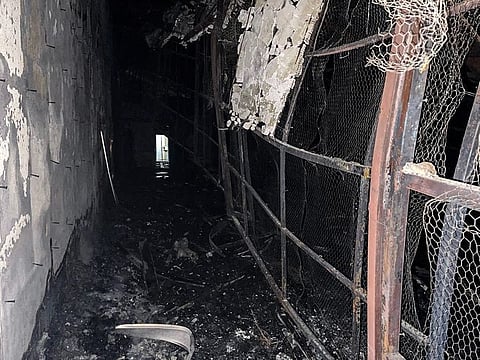 This image obtained from the Iranian news agency IRNA on October 16, 2022, shows damage caused by a fire inside the building of the Evin prison, in the northwest of the Iranian capital Tehran.  