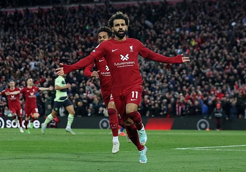 Liverpool's Mohamed Salah celebrates scoring against Man City at Anfield. 