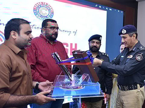 Sindh Police chief, Ghulam Nabi Memon, unveils Talaash gadget for policing.