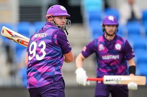 Scotlands George Munsey (left) bats with team mate Michael Jones during the Twenty20 World Cup match against West Indies in Hobart. Scotland face Ireland tomorrow.