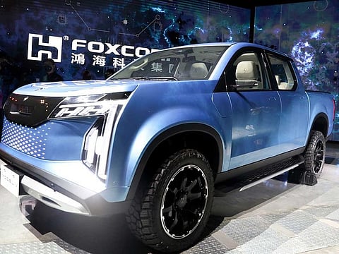Foxconn's Model V pickup truck prototype was unveiled at an event in Taipei on Tuesday, Oct. 18, 2022. The tech subcontractor took the wraps off two new electric vehicles which embody the iPhone maker’s electric vehicle ambitions. 
