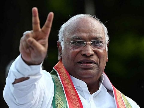 India's Congress party newly appointed president Mallikarjun Kharge gestures after addressing a press conference in New Delhi on October 19, 2022.  