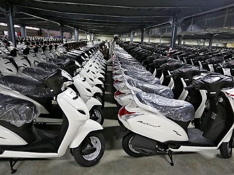 For illustrative purposes only. Scooters are pictured at a stock yard of an assembly line of a Honda Motorcycle & Scooter India manufacturing plant in Vithalapur in the western state of Gujarat, India. Photo taken on June 29, 2016. 