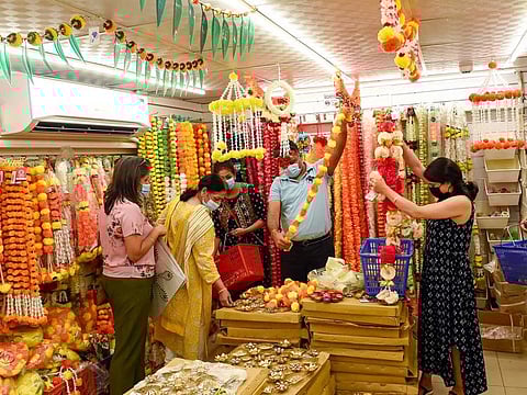Residents seen purchasing decorative pieces ahead of Diwali at Madhoor supermarket in Bur Dubai