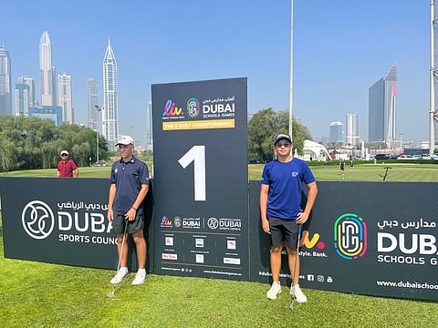 Adrian Larsson (left, 1 handicap) and Ji Li (2.7 handicap) on the 1st tee of the Par 3 course at Emirates Golf Club prior to the Dubai Schools Games.
