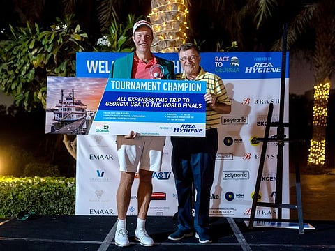 Winner of last season's Race to Georgia Ralph Maenen (left, Montgomerie Golf Club, Dubai) with tournament organiser Keith Watson from REZA Hygiene.