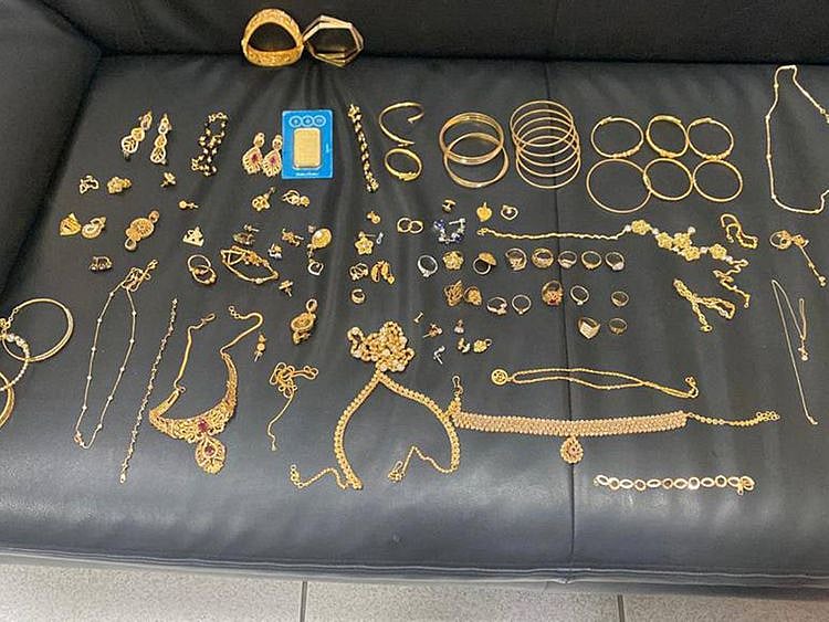 Ajman Police return stolen jewellery to family