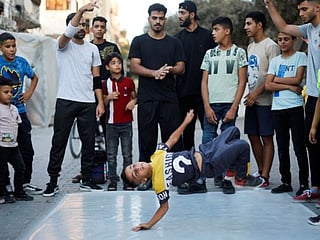 Gaza children breakdance to kick stress away