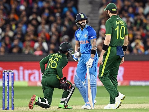 India's Virat Kohli and Pakistan's Shaheen Afridi during the ICC Men's T20 World Cup 2022 Super 12 Group 2 match between India and Pakistan, at Melbourne Cricket Ground, in Melbourne.