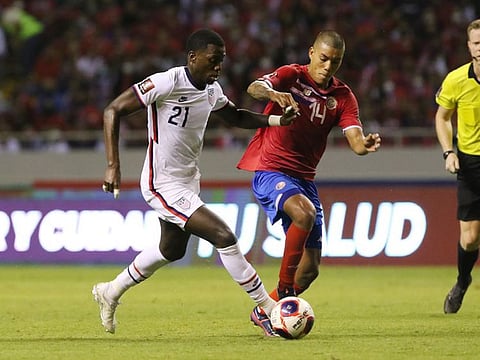Costa Rica midfielder Orlando Galo (right) faces missing the World Cup after FIFA provisionally suspended him for a doping violation.