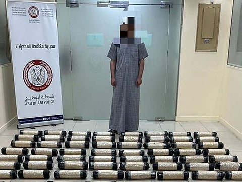 Abu Dhabi Police arrest a man who attempted to smuggle drug in garbage bag rolls